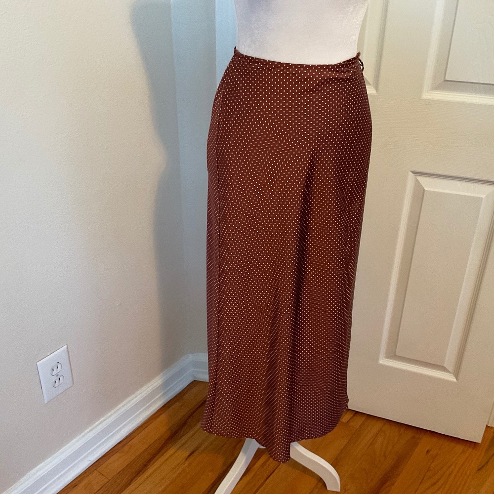 Ladies brand new and never worn size small brown with white mini polka dots.